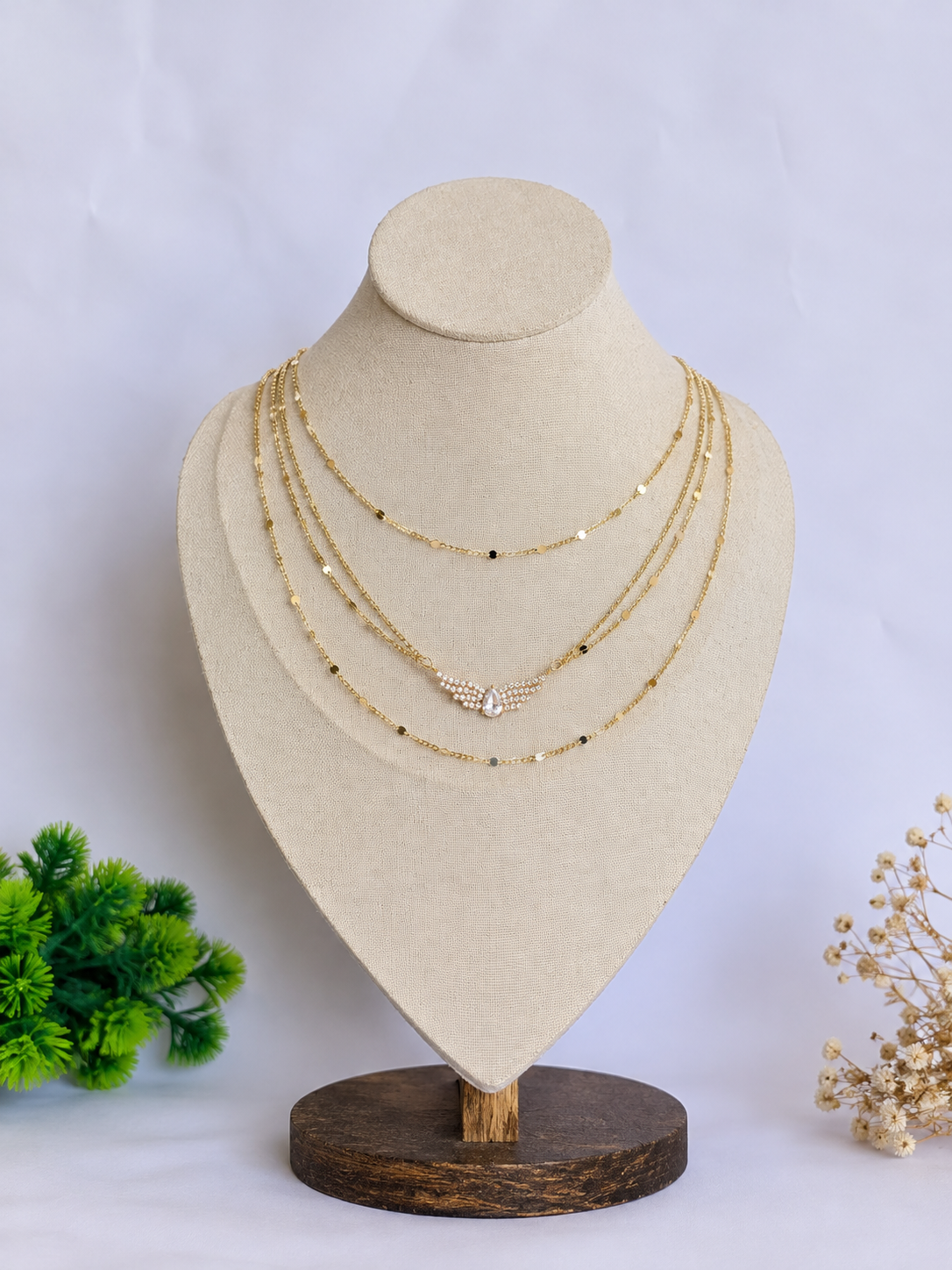 four layer gold wing necklace
